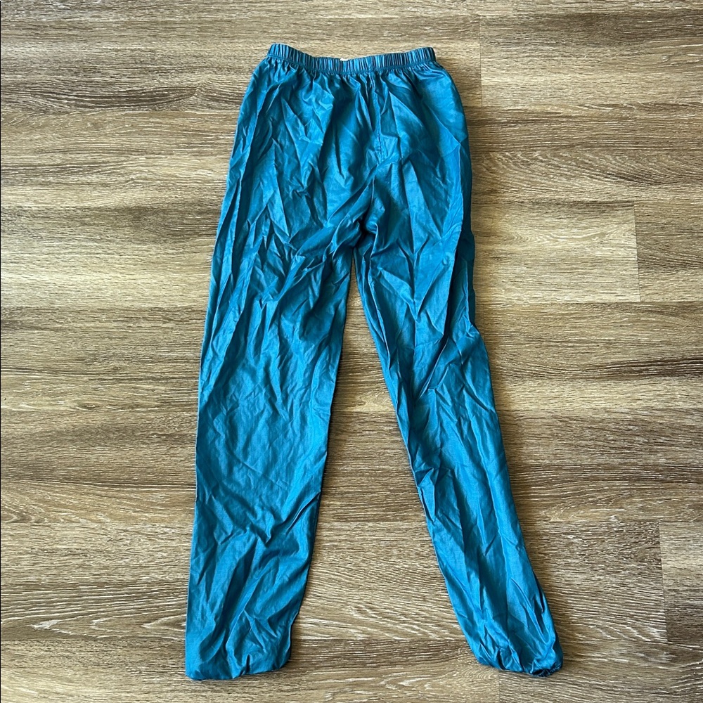 Teal trash bag pants